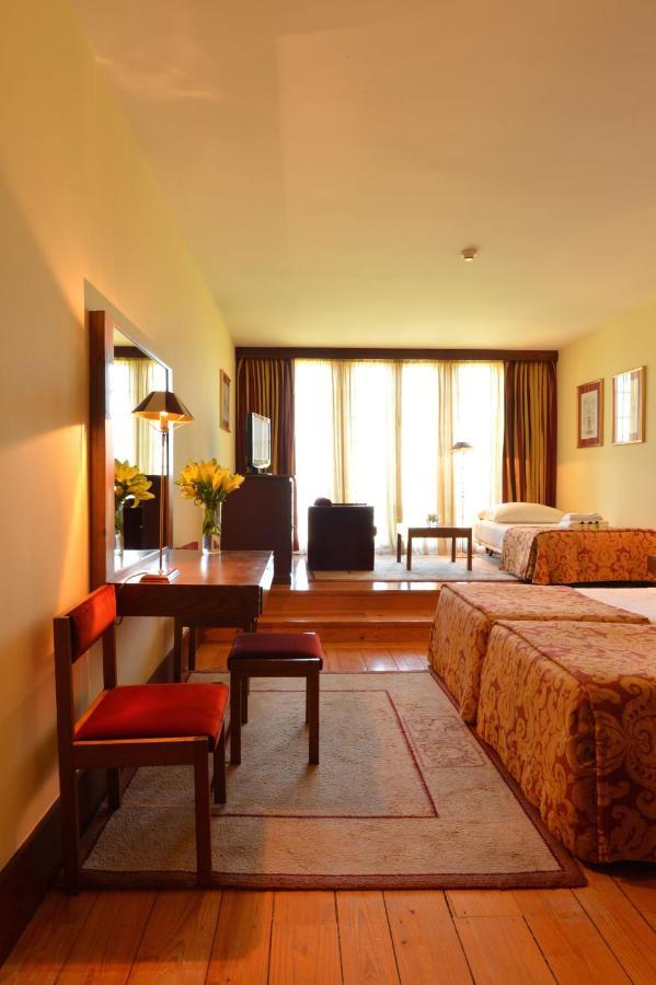 Pousada Mosteiro De Guimarães Esterno foto A room at the hotel