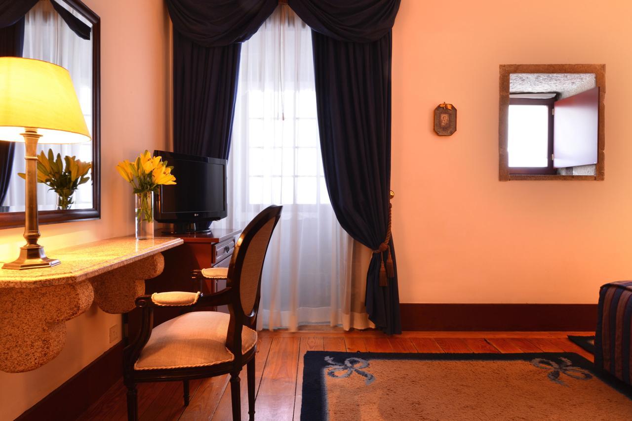 Pousada Mosteiro De Guimarães Camera foto A room at the hotel